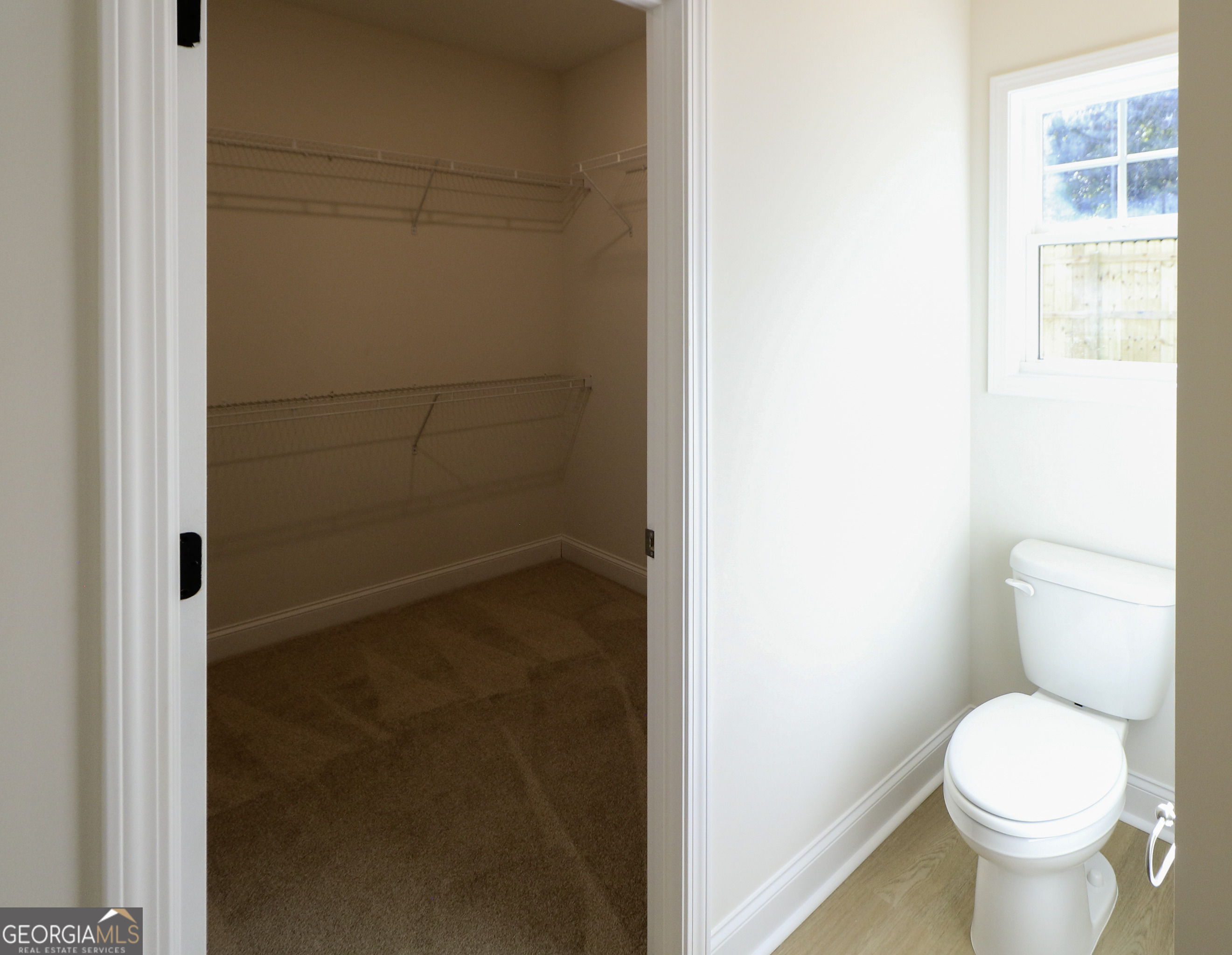 115 Sutter Butte Place Bonaire, GA 31005 - Photo 29 of 38 a bathroom with a toilet and a shower