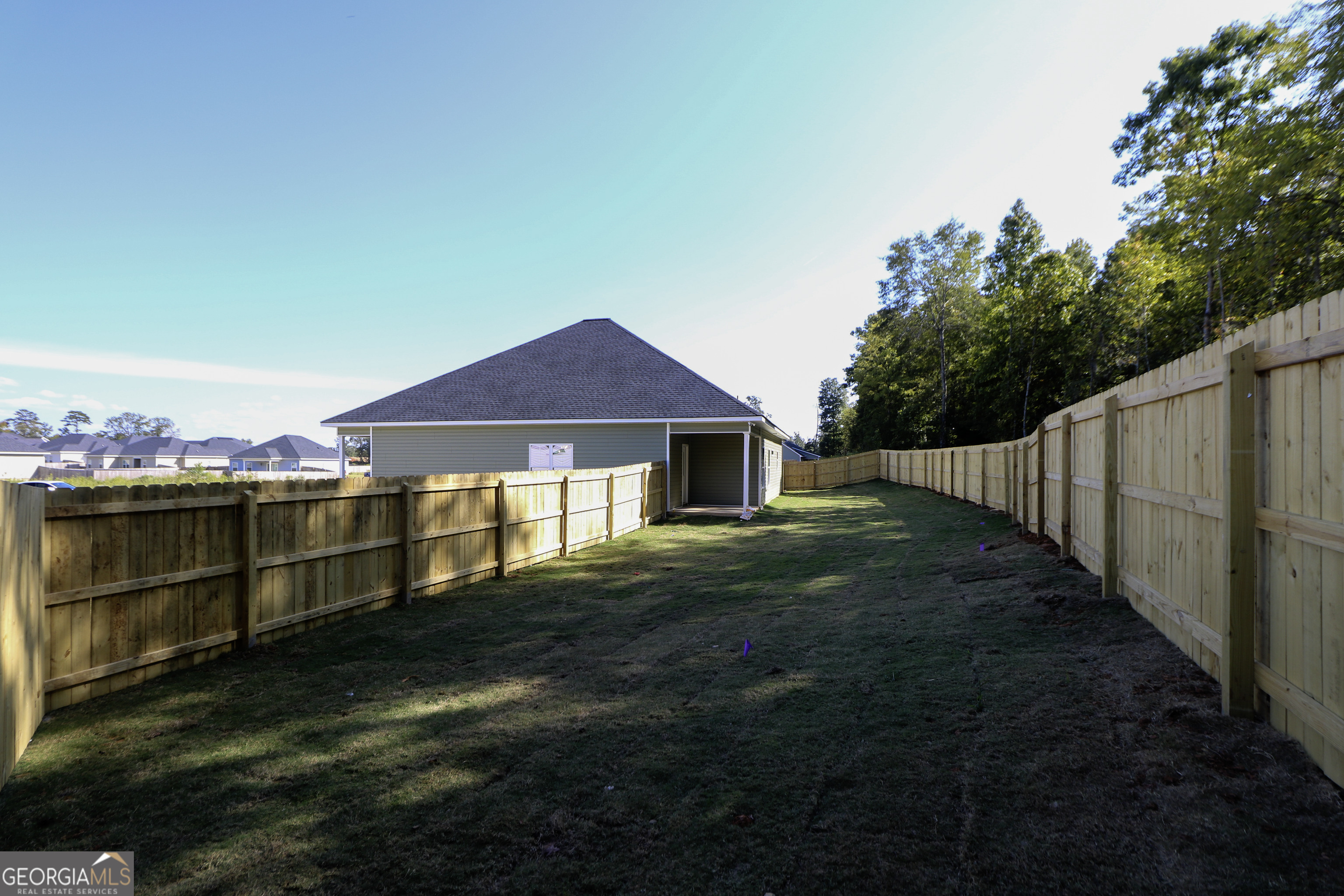 115 Sutter Butte Place Bonaire, GA 31005 - Photo 36 of 38 a view of a house with a yard