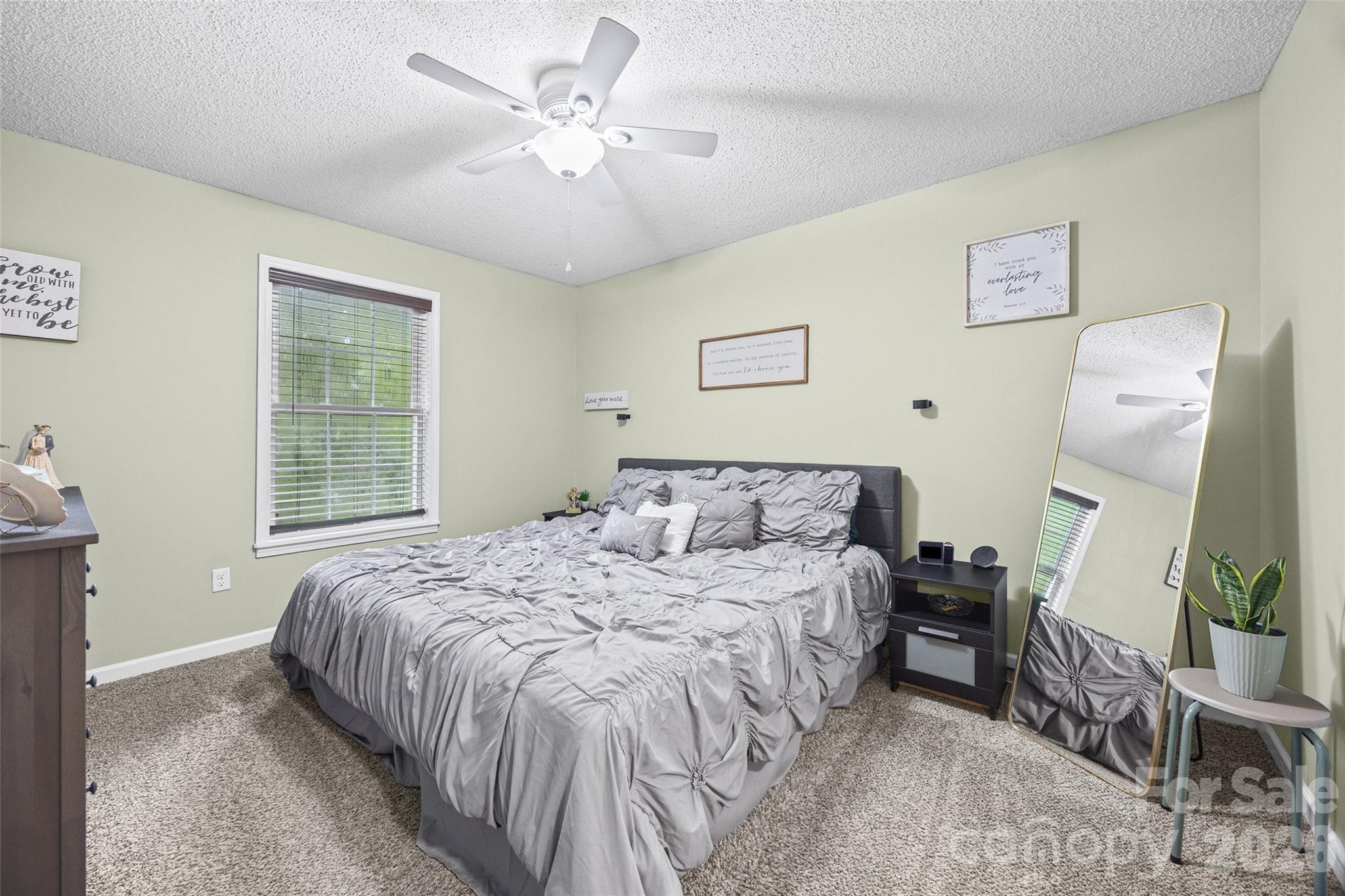 30 7th Street York, SC 29745 - Photo 19 of 29 a bedroom with a large bed and a window
