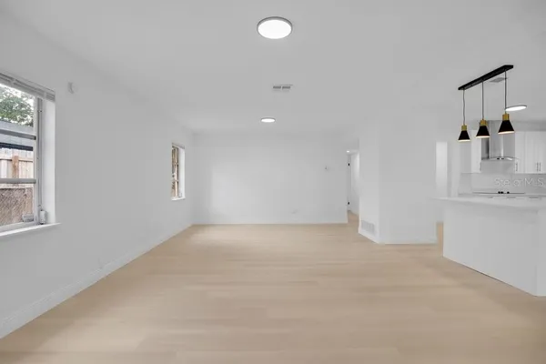 an empty room with windows