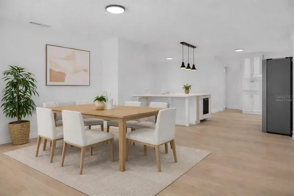 a view of a dining room with furniture