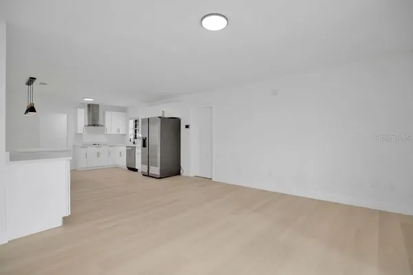 a view of a kitchen with a sink