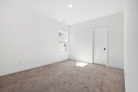 an empty room with an entryway