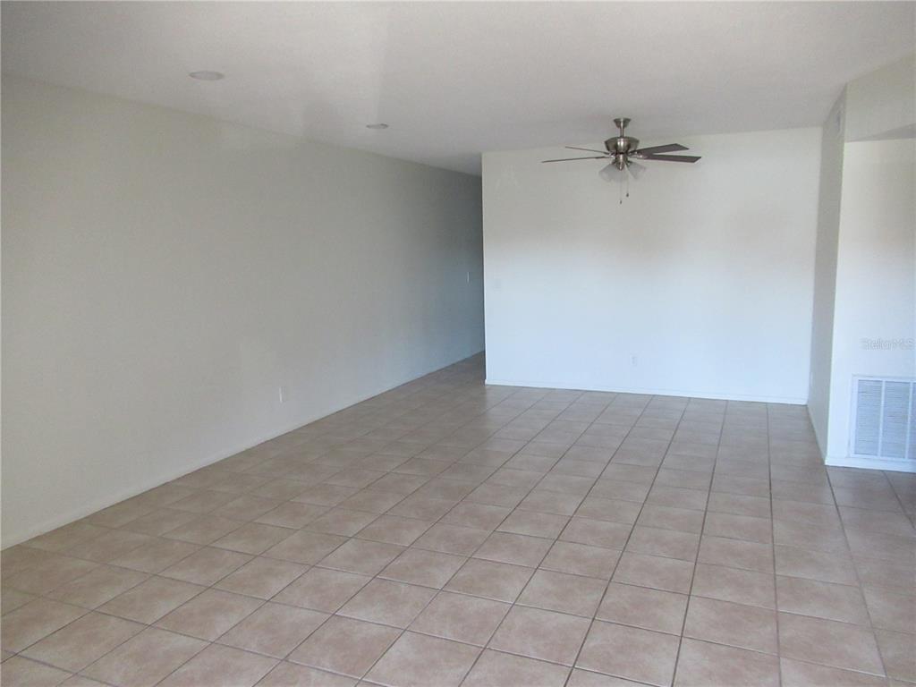 2073 Denmark Street, Unit 5 Clearwater, FL 33763 - Photo 2 of 23 wooden floor in an empty room