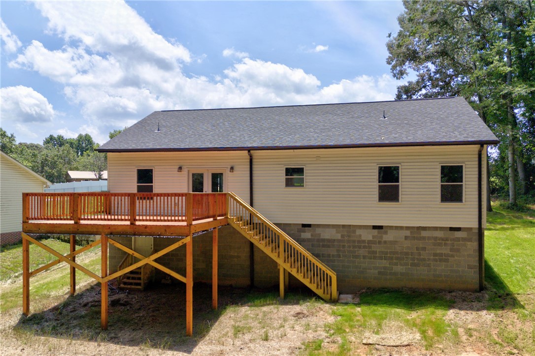 223 Maple Drive Anderson, SC 29621 - Photo 44 of 45 A spacious wooden deck extends from the rear of this home, perfect for outdoor enjoyment.