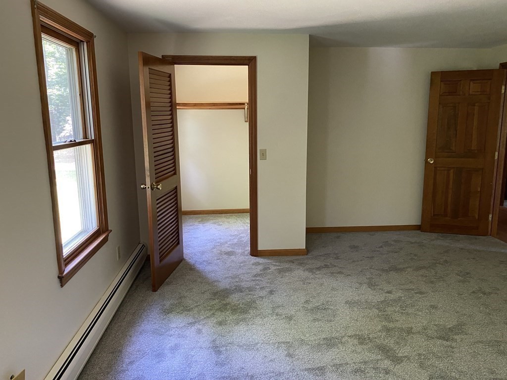 781 Townsend Road Groton, MA 01450 - Photo 18 of 21 an empty room with windows