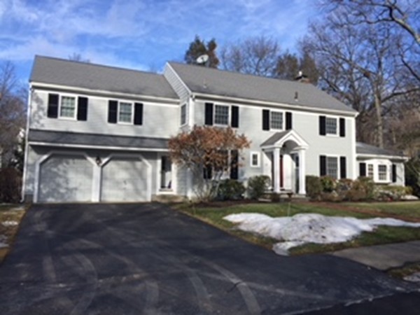 33 Oakridge Road Wellesley, MA 02481 - Photo 1 of 27 a front view of a house with a yard