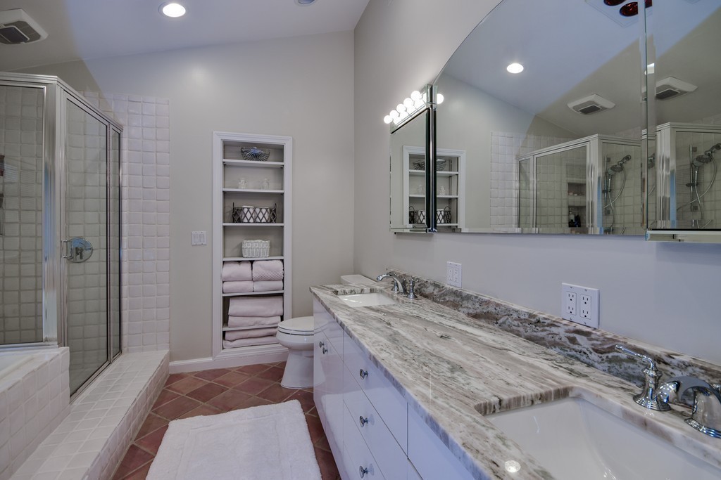 33 Oakridge Road Wellesley, MA 02481 - Photo 15 of 27 a spacious bathroom with a granite countertop sink a toilet and shower