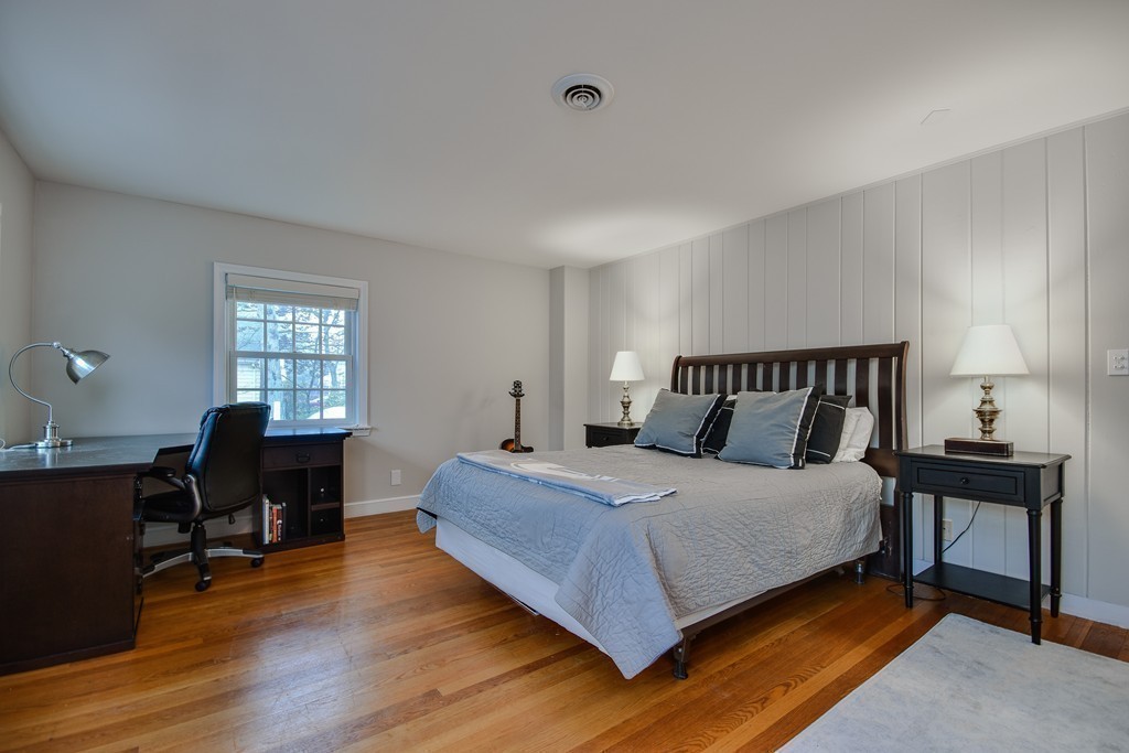33 Oakridge Road Wellesley, MA 02481 - Photo 17 of 27 a bedroom with a bed and a window