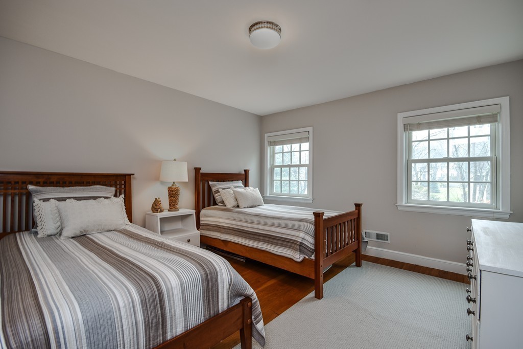 33 Oakridge Road Wellesley, MA 02481 - Photo 20 of 27 a bedroom with two beds and window