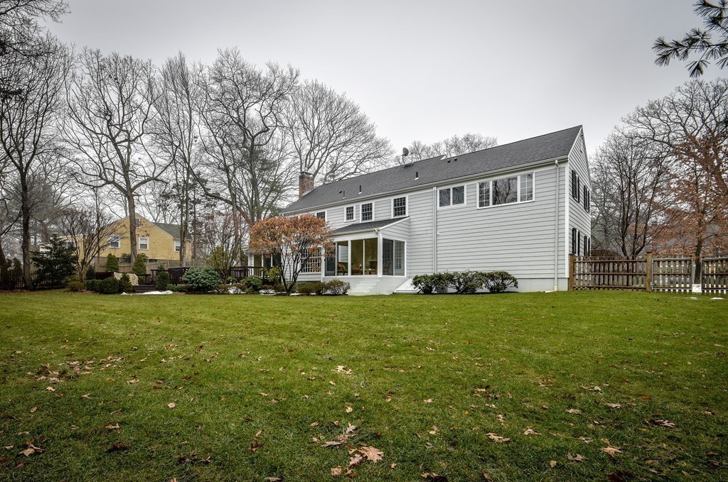 33 Oakridge Road Wellesley, MA 02481 - Photo 27 of 27 a front view of a house with a garden