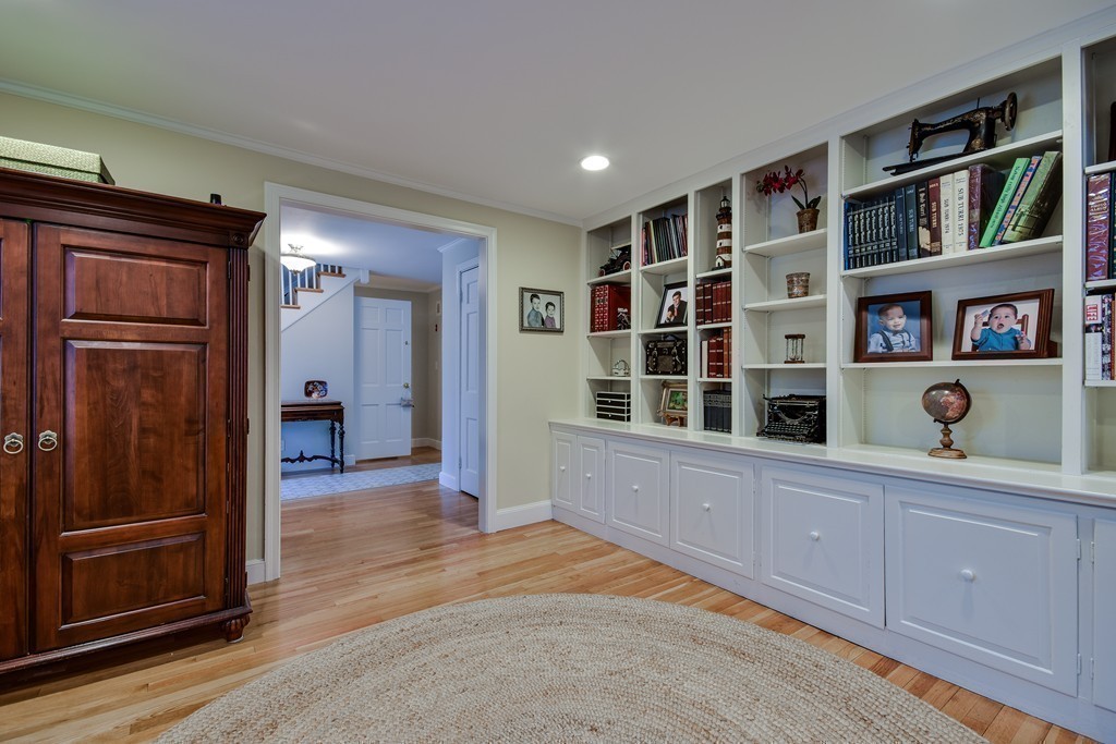 33 Oakridge Road Wellesley, MA 02481 - Photo 6 of 27 a view of an entryway with wooden cabinet