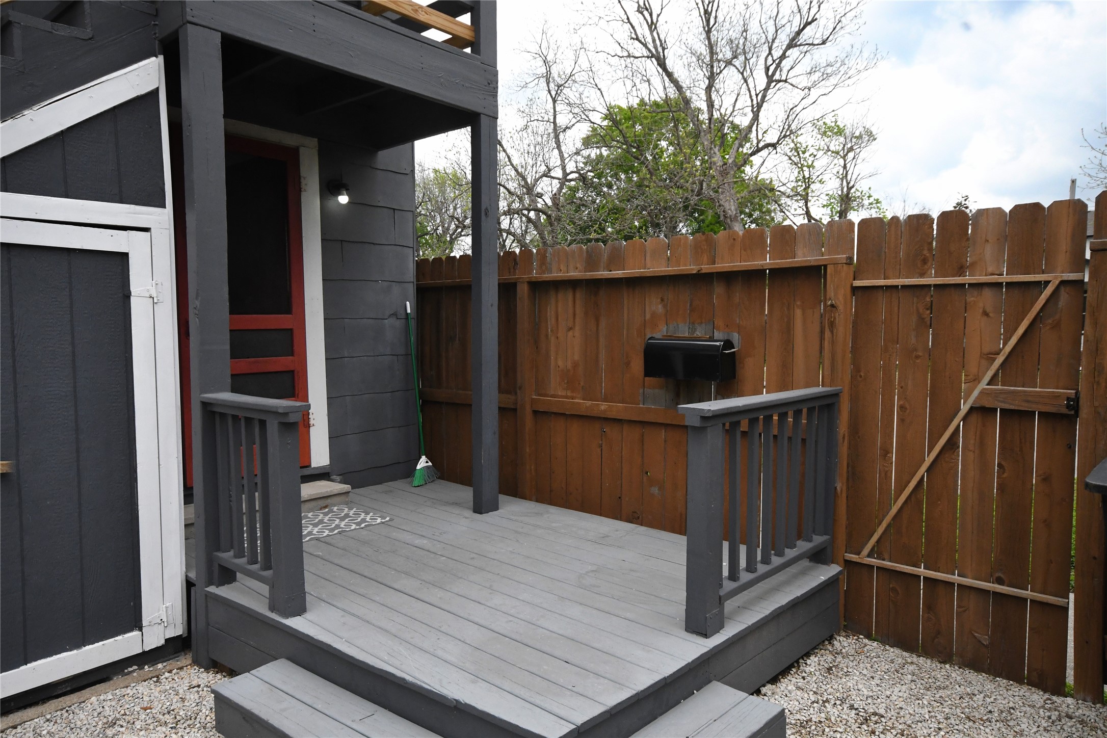 1209 Studewood Street Houston, TX 77008 - Photo 17 of 18 a view of a balcony with wooden floor and stairs