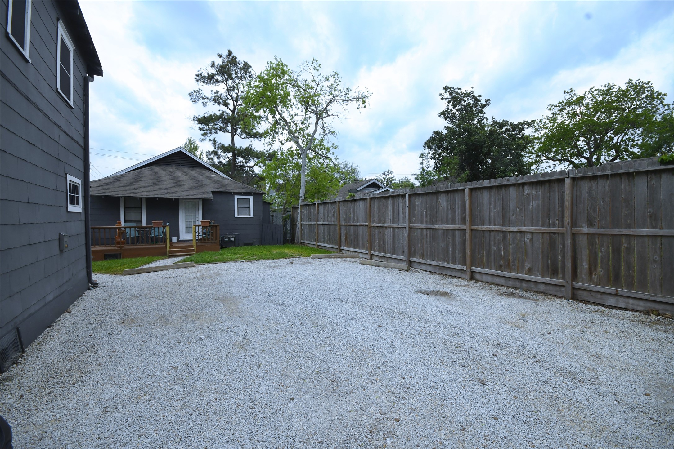 1209 Studewood Street Houston, TX 77008 - Photo 18 of 18 a view of a backyard with a small cabin and chair