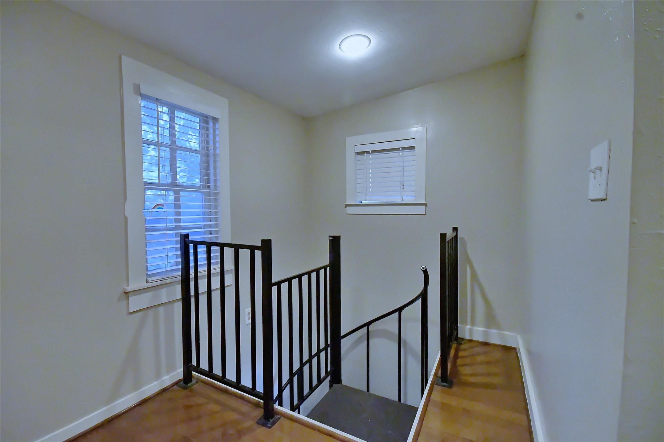 1209 Studewood Street Houston, TX 77008 - Photo 10 of 18 a view of a hallway with windows