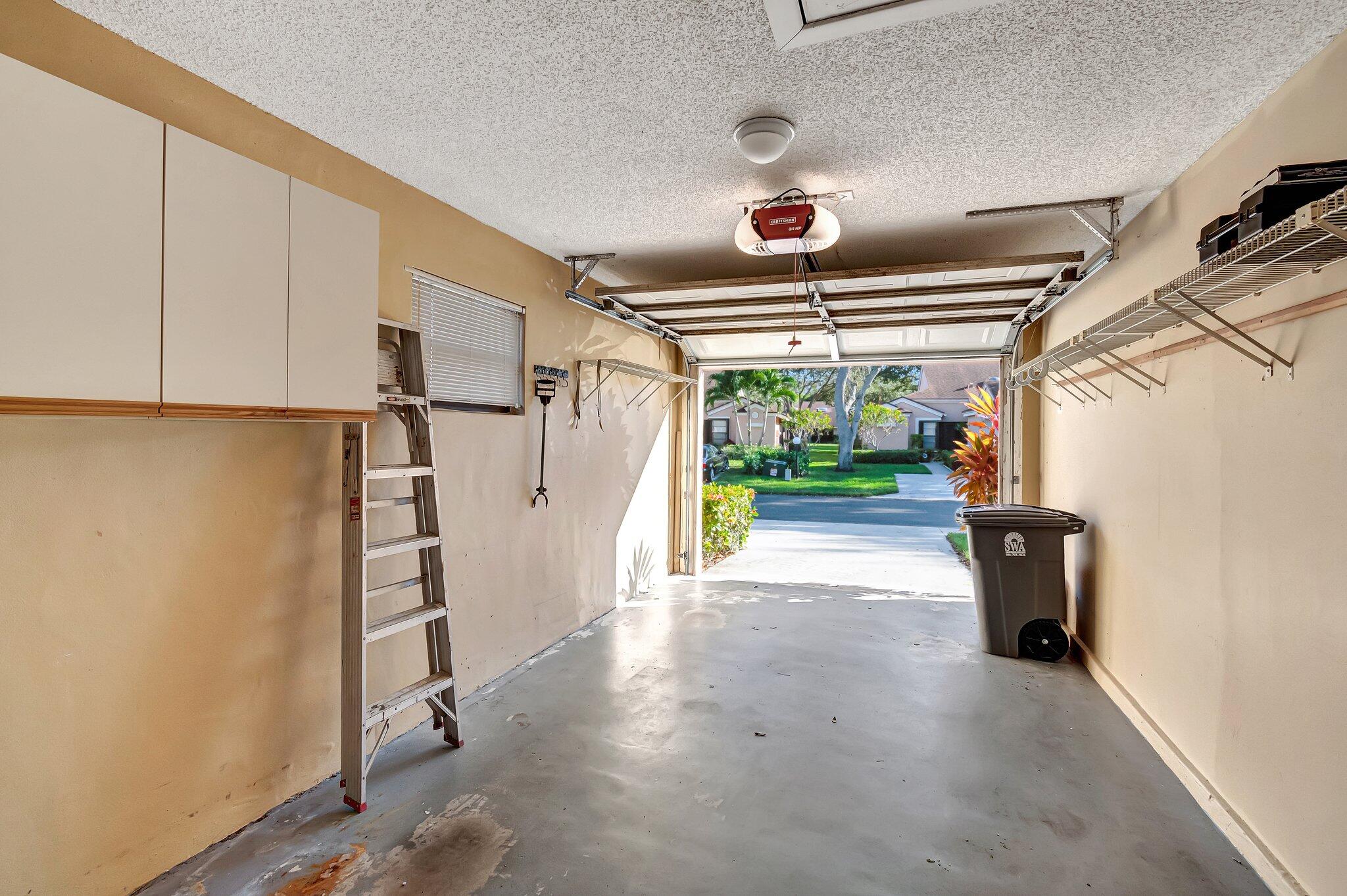 8289 Summersong Terrace, Unit H Boca Raton, FL 33496 - Photo 31 of 54 GARAGE