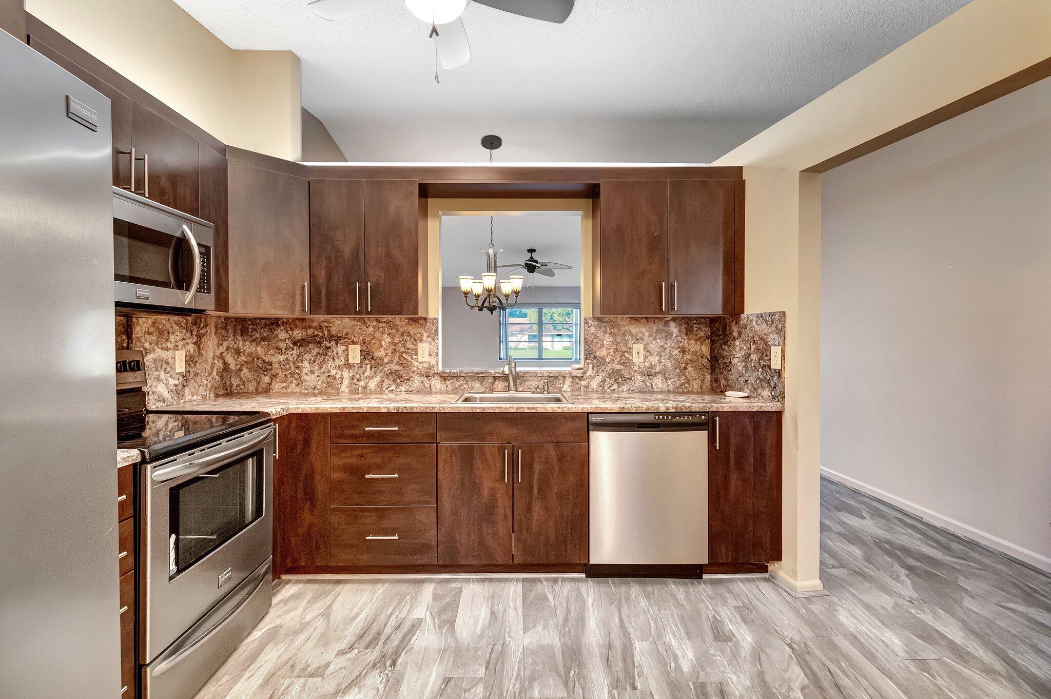 8289 Summersong Terrace, Unit H Boca Raton, FL 33496 - Photo 10 of 54 KITCHEN