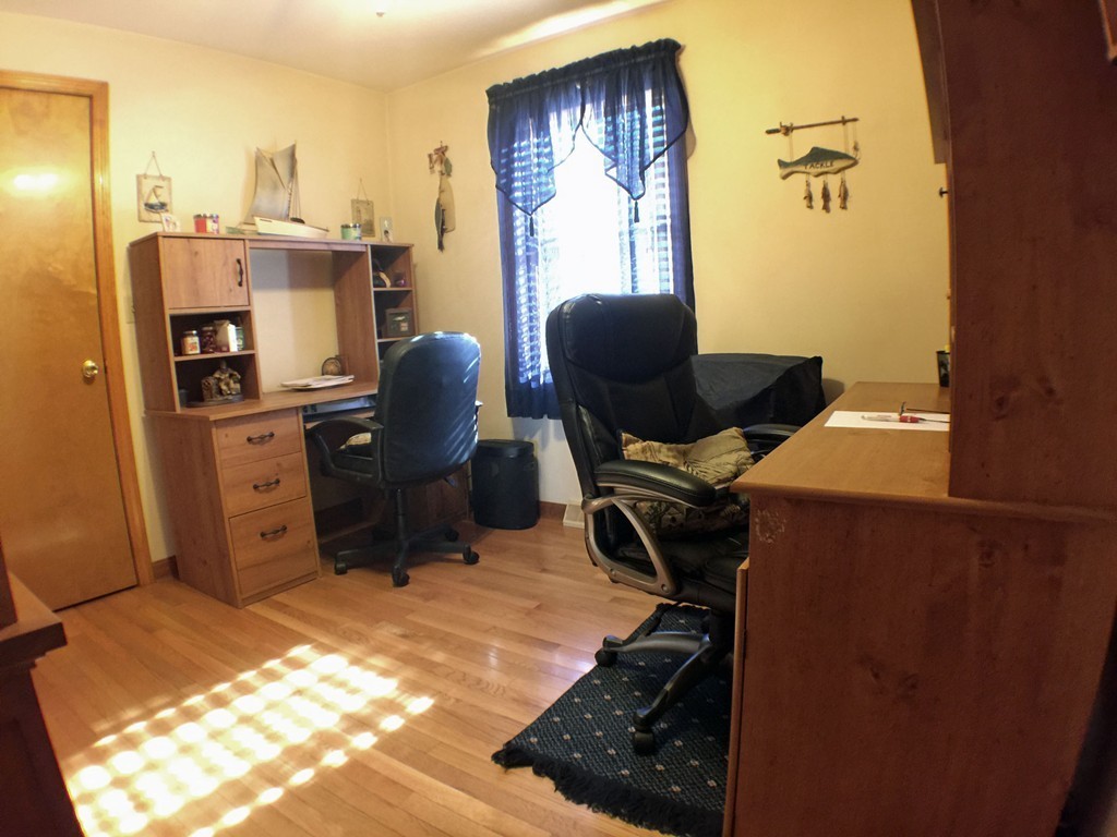 45 Jefferson Street Fall River, MA 02721 - Photo 7 of 16 a view of a workspace with furniture and a window