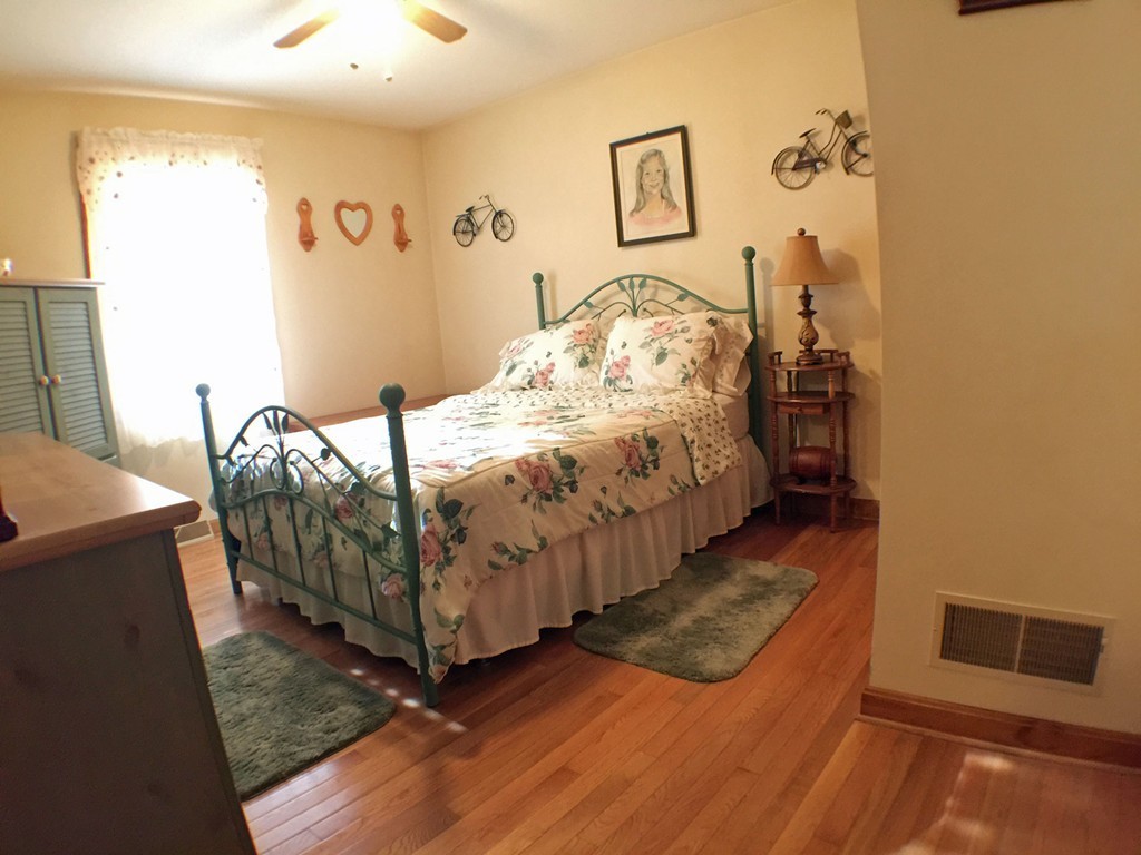 45 Jefferson Street Fall River, MA 02721 - Photo 8 of 16 a bedroom with bed and a window