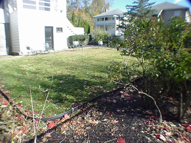8-10 Kenrick Street, Unit 10 Boston, MA 02135 - Photo 28 of 28 a view of a house with a yard