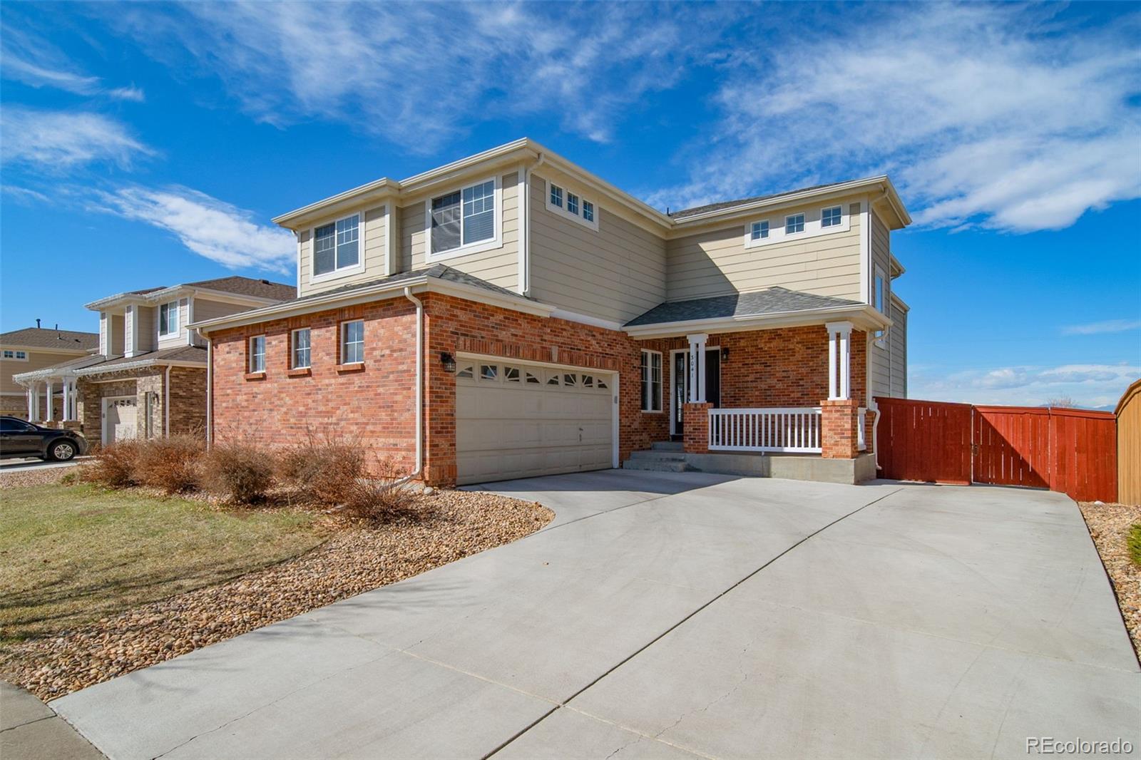 3041 South Jericho Way Aurora, CO 80013 - Photo 1 of 46 a front view of a house with a yard