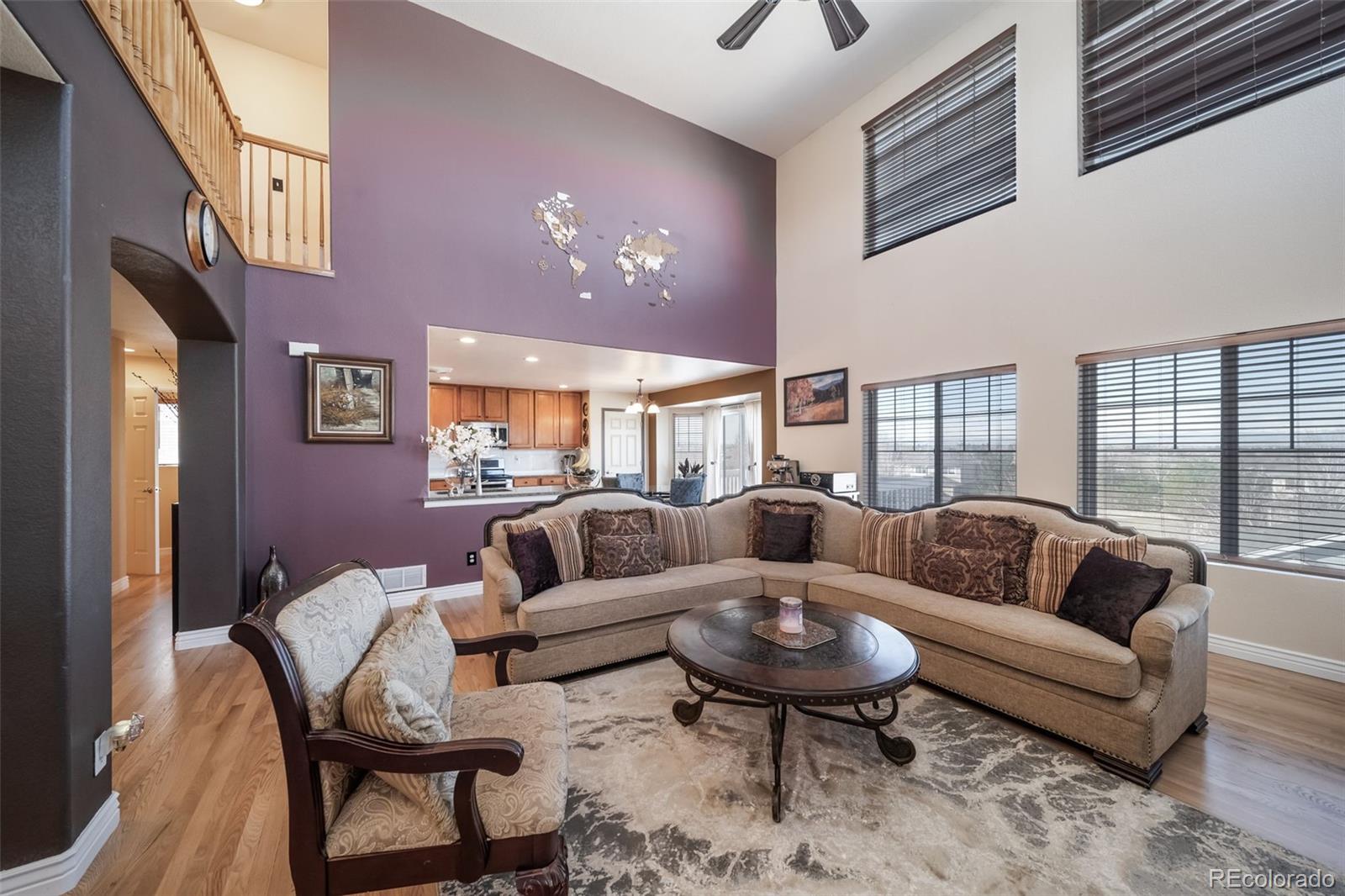 3041 South Jericho Way Aurora, CO 80013 - Photo 11 of 46 a living room with furniture and a large window