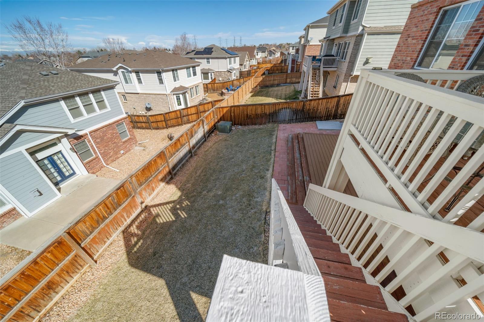 3041 South Jericho Way Aurora, CO 80013 - Photo 23 of 46 a view of a balcony with wooden floor