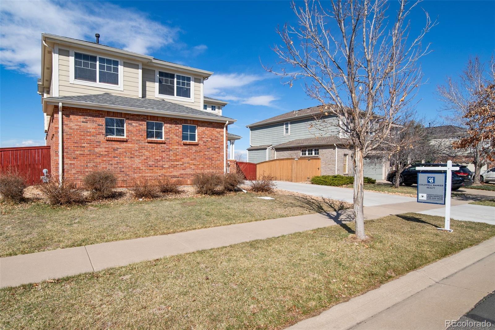 3041 South Jericho Way Aurora, CO 80013 - Photo 3 of 46 a view of a yard in front of a house