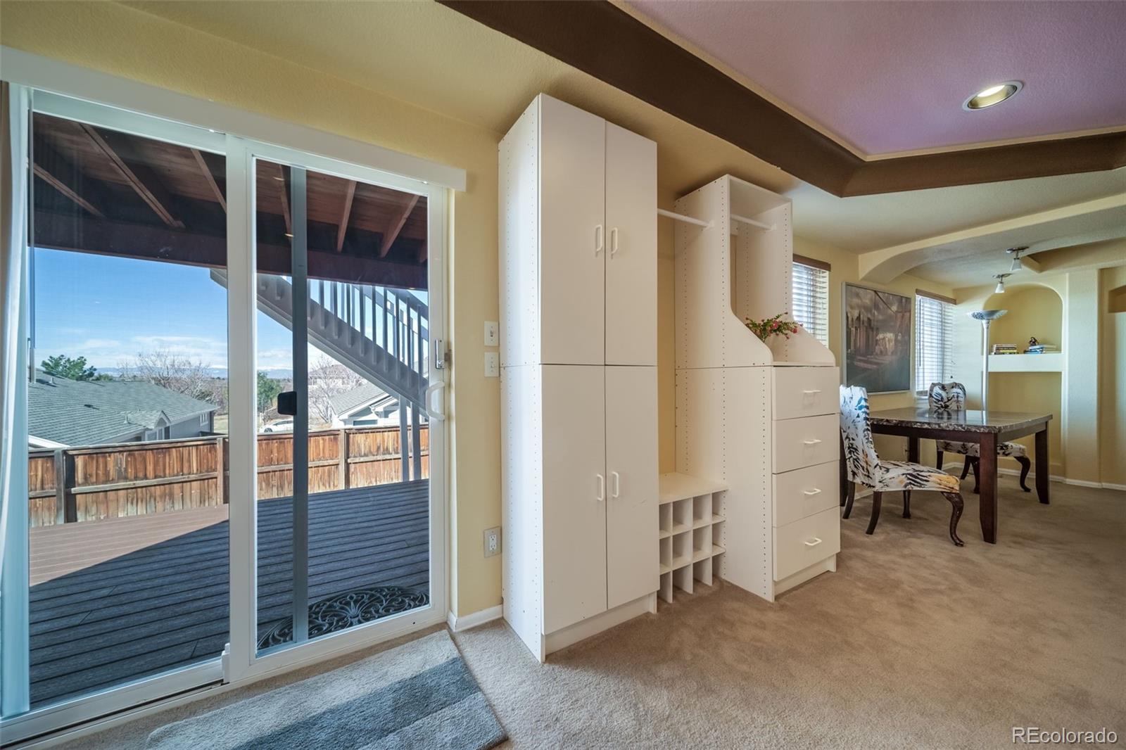 3041 South Jericho Way Aurora, CO 80013 - Photo 42 of 46 a view of a hallway with seating area