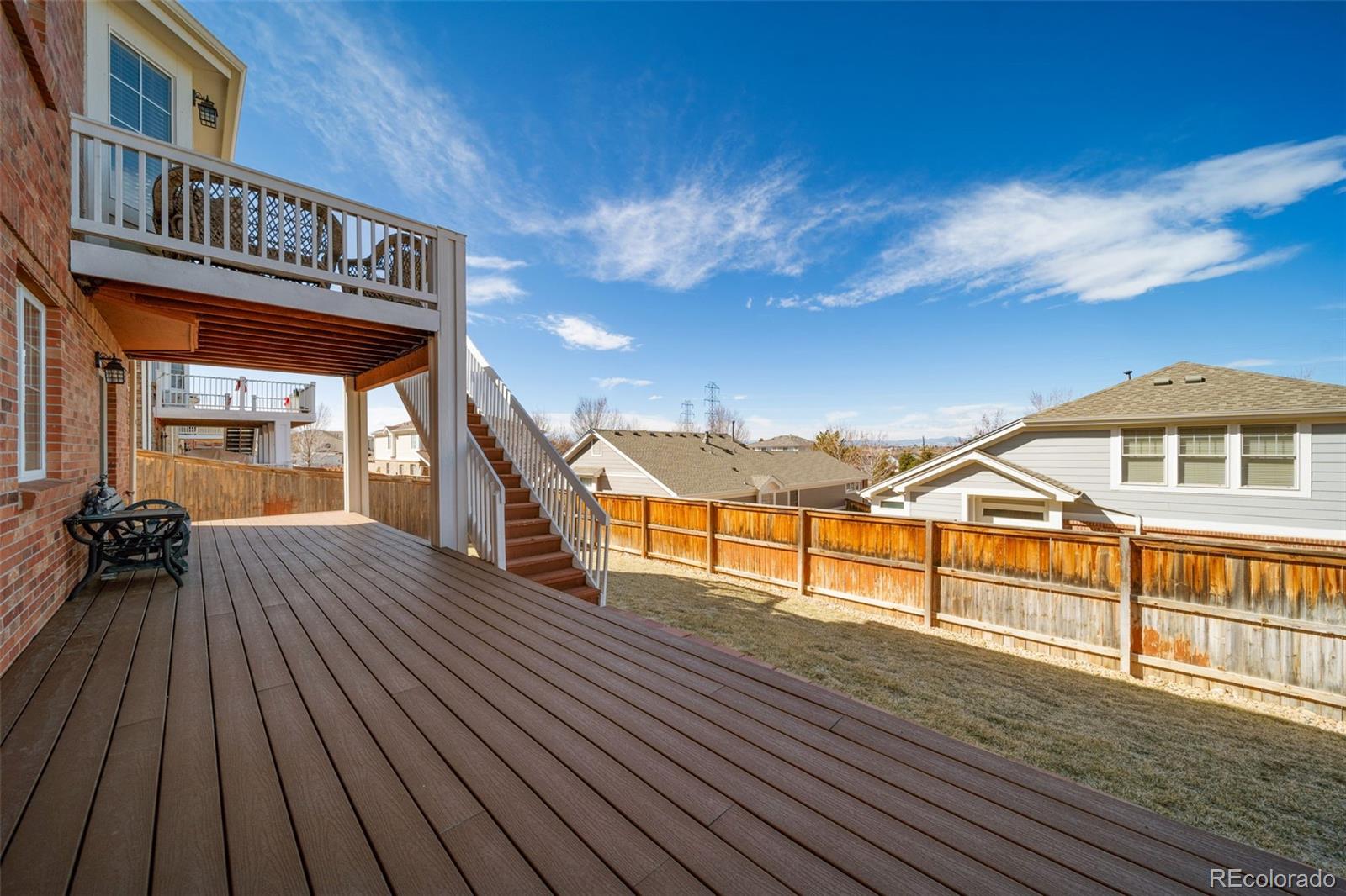 3041 South Jericho Way Aurora, CO 80013 - Photo 44 of 46 a view of a house with a balcony