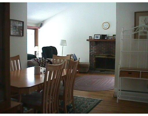 18 Cooper Pond Road Rowley, MA 01969 - Photo 6 of 8 a view of a dining room with furniture