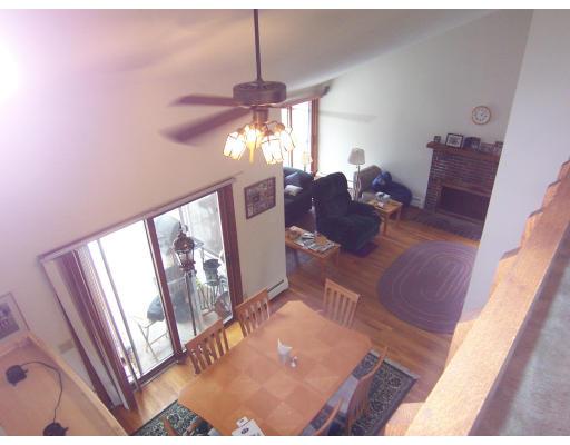 18 Cooper Pond Road Rowley, MA 01969 - Photo 7 of 8 a living room with furniture and a flat screen tv