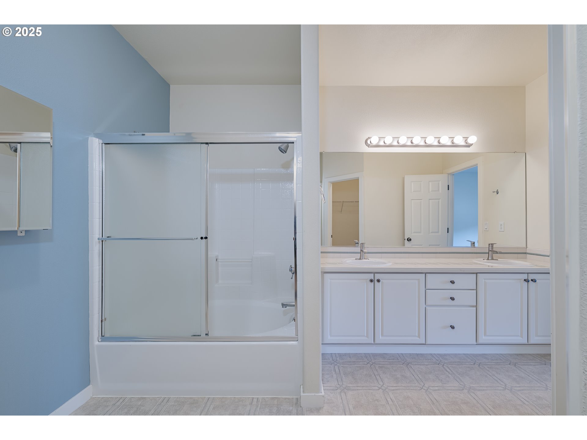 384 Southwest 105th Terrace Portland, OR 97225 - Photo 11 of 30 a bathroom with a sink a mirror and a shower