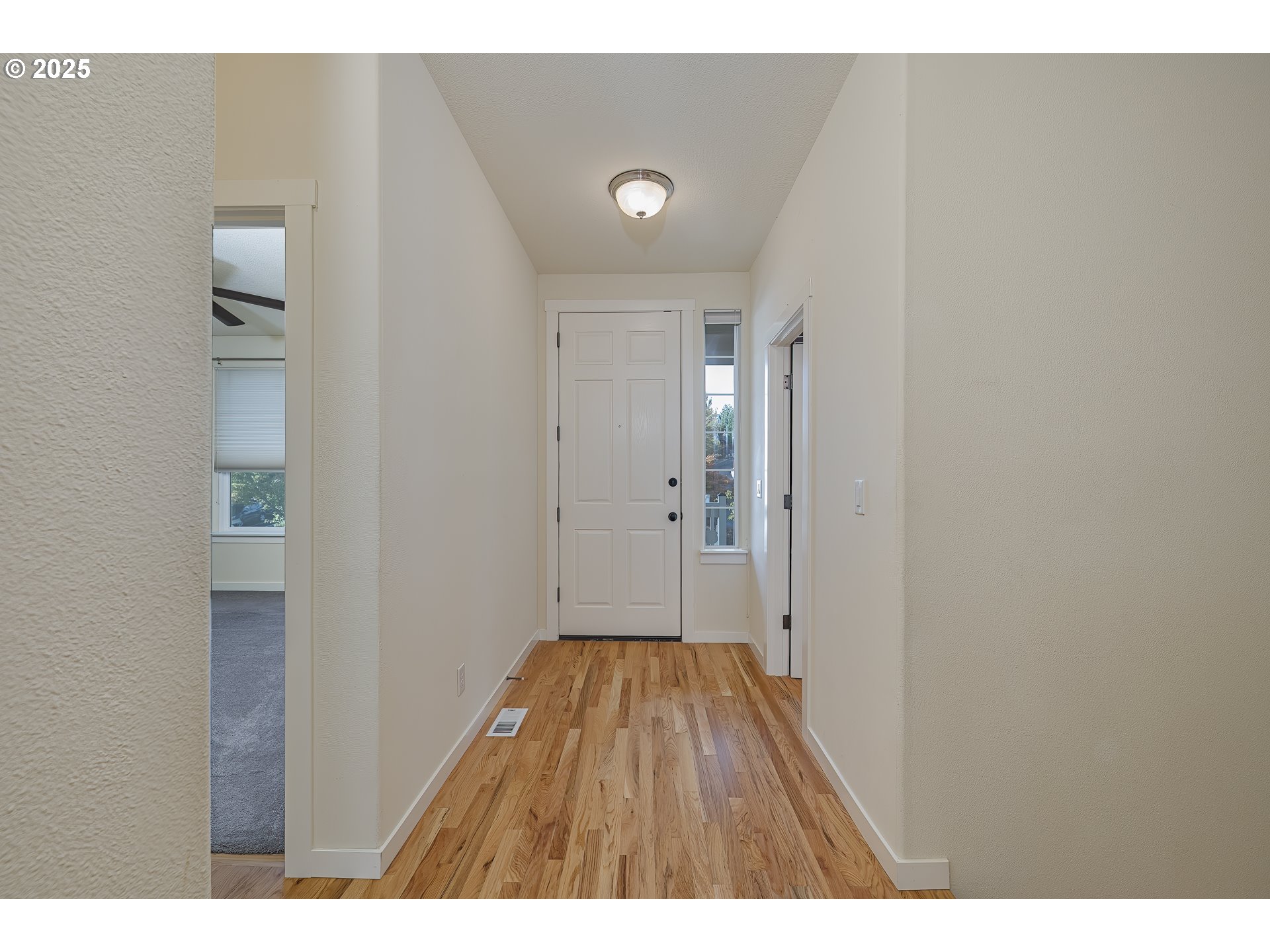 384 Southwest 105th Terrace Portland, OR 97225 - Photo 15 of 30 a view of hallway with wooden floor