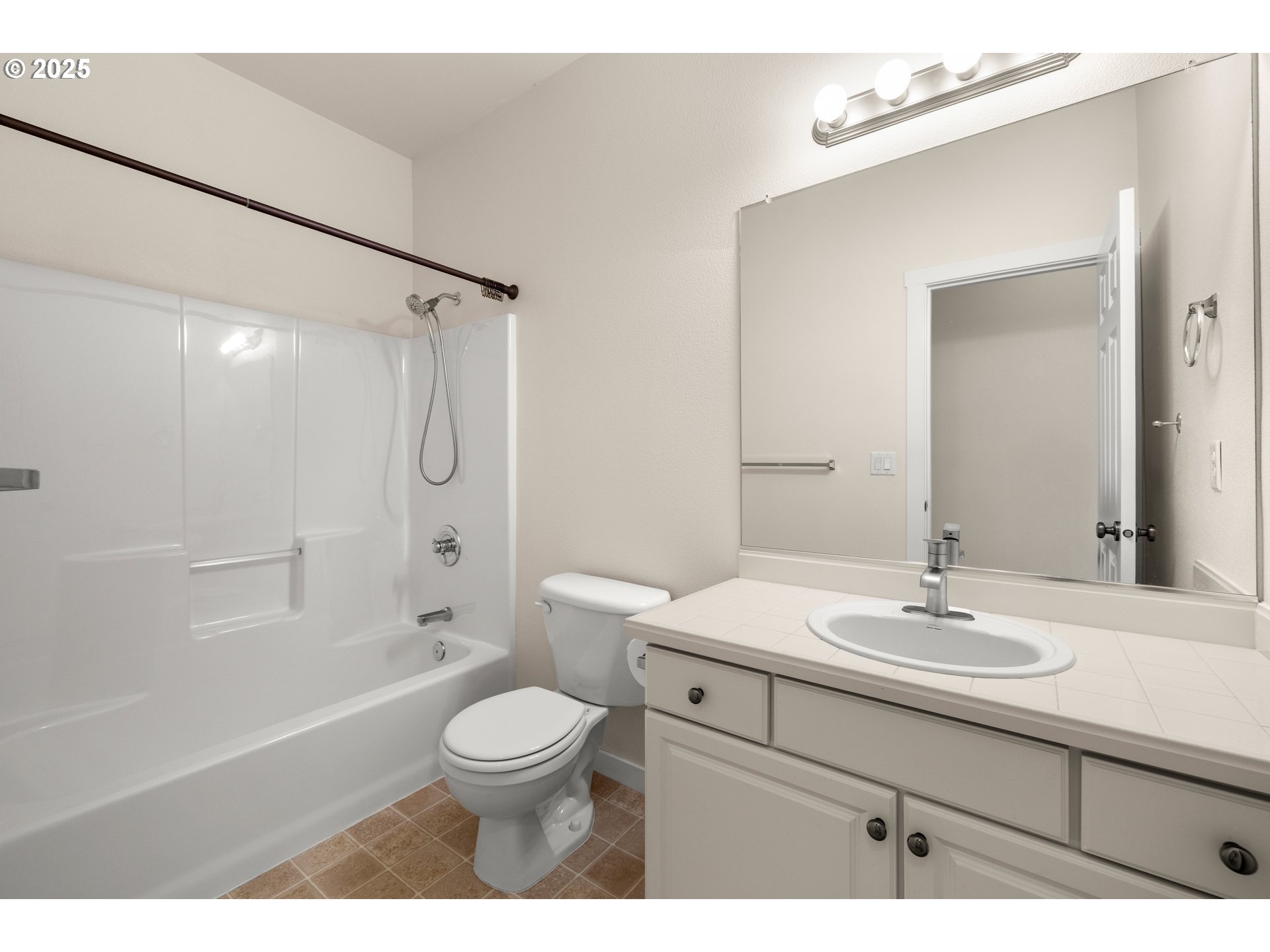 384 Southwest 105th Terrace Portland, OR 97225 - Photo 18 of 30 a bathroom with a sink toilet a mirror and shower