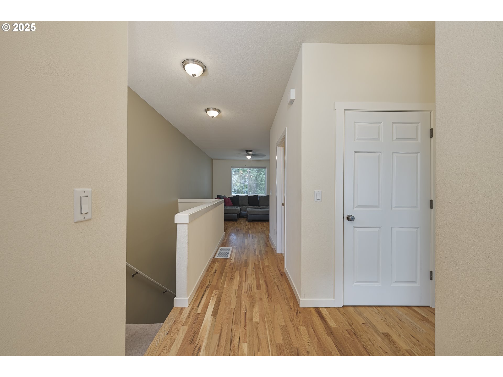 384 Southwest 105th Terrace Portland, OR 97225 - Photo 2 of 30 a view of hallway with wooden floor