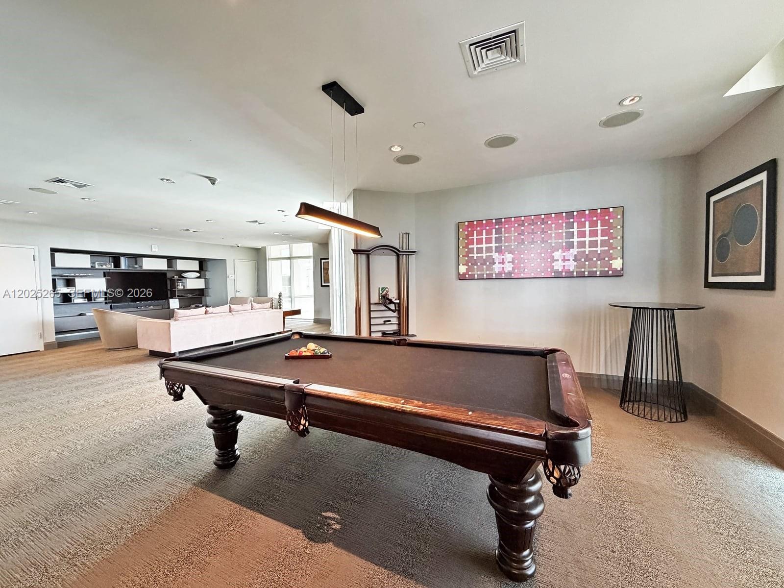 2525 Southwest 3rd Avenue, Unit 705 Miami, FL 33129 - Photo 23 of 26 a room with furniture pool table and flat screen tv
