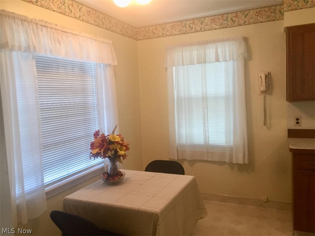 13812 Granger Road Cleveland, OH 44125 - Photo 9 of 29 Here is yet another view of the inviting dining area with two large windows.