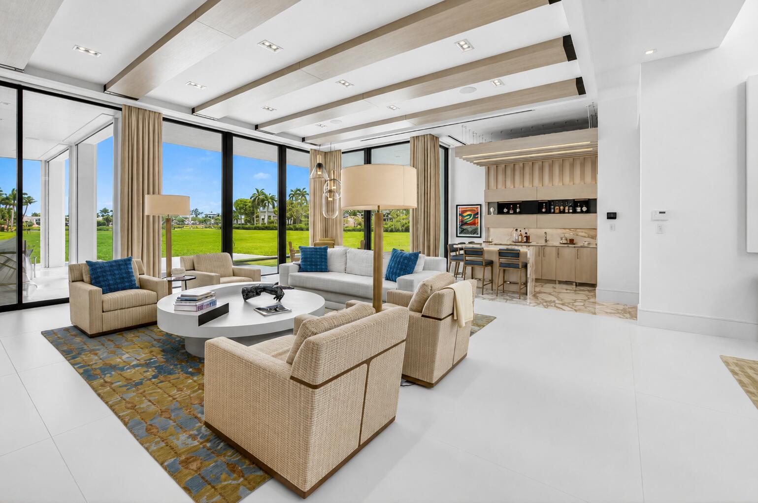 6960 Lake Estates Court Boca Raton, FL 33496 - Photo 7 of 58 a living room with furniture and a large window