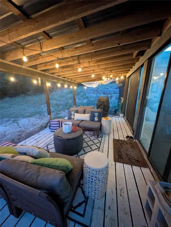 a balcony with furniture