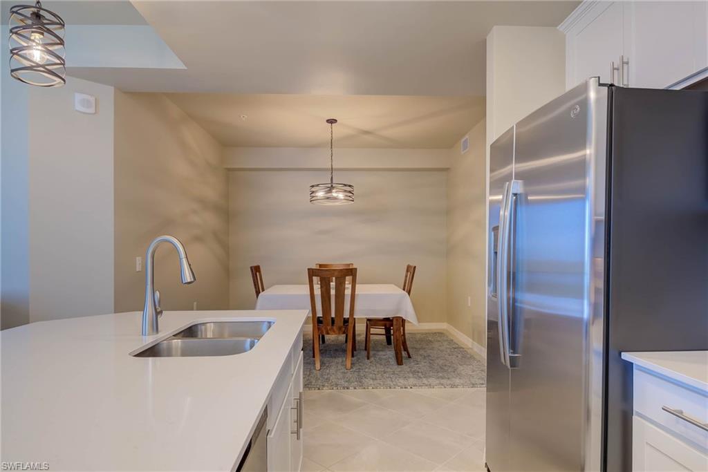 5715 Double Eagle Circle, Unit 4421 Immokalee, FL 34142 - Photo 8 of 31 Kitchen with dining area
