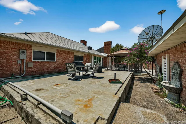 a view of a living room and dining room