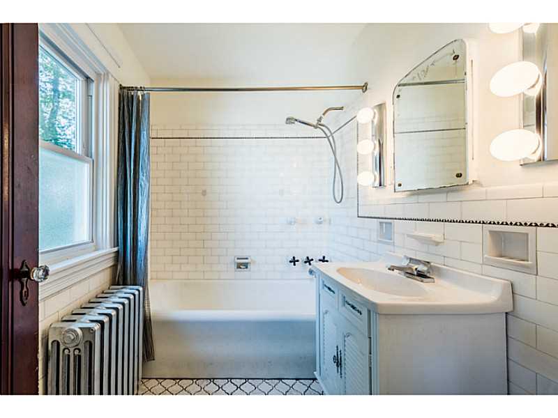 105 Lyndon Road Cranston, RI 02905 - Photo 17 of 25 Bathroom. 2nd floor main bathroom with ceramic tile, tub & shower.