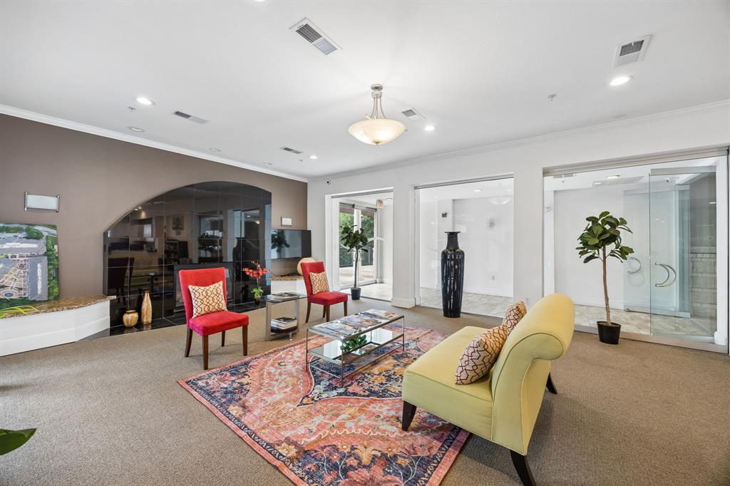 3102 Kings Road, Unit 1211 Dallas, TX 75219 - Photo 22 of 27 Spacious interior featuring recessed lighting, crown molding, and glass partitions
