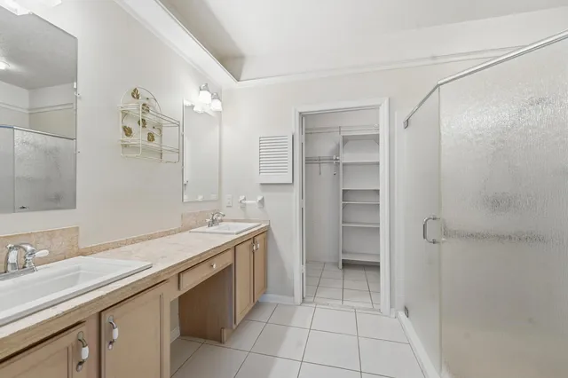 a bathroom with a shower and toilet