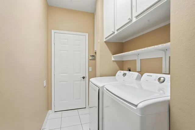 a view of a room with storage and utility room