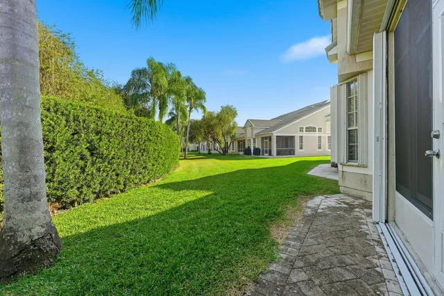 a view of houses with an outdoor space and lakeside