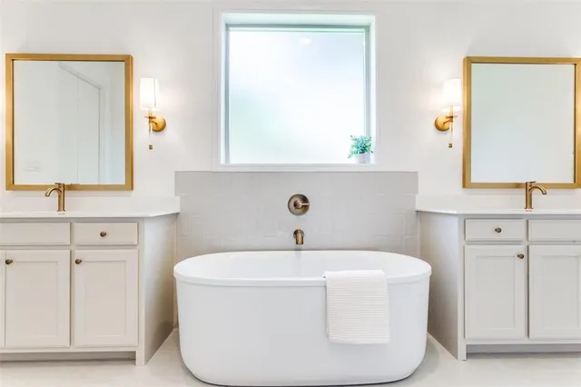 a view of a dining room and livingroom with furniture wooden floor a chandelier