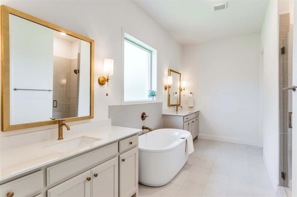 8965 Armstrong Court Benbrook, TX 76126 - Photo 11 of 24 a bathroom with a granite countertop sink mirror and a toilet