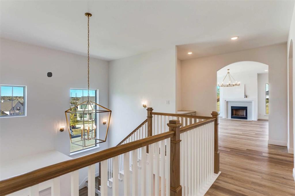 8965 Armstrong Court Benbrook, TX 76126 - Photo 12 of 24 a view of an entryway with wooden floor
